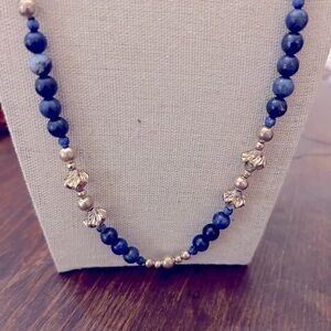 28 in lapis stone necklace. Silver beads in between lapis. Nice clasp